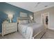 Bright bedroom with neutral tones and ensuite access at 3713 Savanna Palms Ct, Bradenton, FL 34211