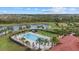 Resort-style pool with lounge chairs and palm trees at 3713 Savanna Palms Ct, Bradenton, FL 34211