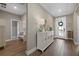 Light and airy entryway with decorative console table at 3713 Savanna Palms Ct, Bradenton, FL 34211