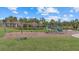 Community playground with swings and climbing equipment at 3713 Savanna Palms Ct, Bradenton, FL 34211