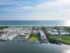 Coastal community featuring a private beach, boat docks and easy water access at 3810 Gulf Of Mexico Dr # F105, Longboat Key, FL 34228