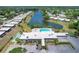 Aerial view of Glen Oaks community, pool, and lake at 3904 Lakeside Rd # 174, Sarasota, FL 34232