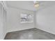 Bright bedroom with a window, closet and polished concrete floors at 3904 Lakeside Rd # 174, Sarasota, FL 34232