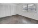 Spacious bedroom with large closet and polished concrete floors at 3904 Lakeside Rd # 174, Sarasota, FL 34232