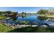 Serene lake with lush greenery at 3904 Lakeside Rd # 174, Sarasota, FL 34232