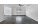 Bright living room with concrete floors and ceiling fan at 3904 Lakeside Rd # 174, Sarasota, FL 34232