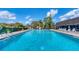 Inviting community pool with plenty of lounge chairs at 3904 Lakeside Rd # 174, Sarasota, FL 34232