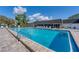 Relaxing community pool with lounge chairs at 3904 Lakeside Rd # 174, Sarasota, FL 34232