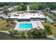 Aerial view of community pool and surrounding area at 3904 Lakeside Rd # 174, Sarasota, FL 34232