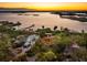 Luxury home on waterfront property at sunset at 3930 Red Rock Way, Sarasota, FL 34231