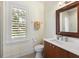 Well-appointed bathroom with a toilet, vanity, and plenty of natural light at 3930 Red Rock Way, Sarasota, FL 34231