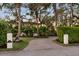 Brick driveway leading to a Mediterranean-style home at 3930 Red Rock Way, Sarasota, FL 34231