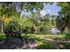 Serene pond with fountain, surrounded by lush greenery at 401 Spring Lakes Blvd # 401, Bradenton, FL 34210