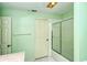 Bright bathroom with tub, shower, and vanity at 4250 Players Pl # 2625, Sarasota, FL 34238