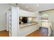 Kitchen boasts a breakfast bar and light-colored cabinetry at 4250 Players Pl # 2625, Sarasota, FL 34238