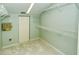 Spacious walk-in closet with wire shelving at 4250 Players Pl # 2625, Sarasota, FL 34238