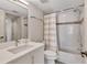 Bathroom with tub, shower, and updated vanity at 4402 Weybridge St # 95, Sarasota, FL 34235