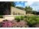 The Meadows community entrance with attractive landscaping at 4402 Weybridge St # 95, Sarasota, FL 34235