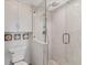 Walk-in shower with glass enclosure and marble tile at 4402 Weybridge St # 95, Sarasota, FL 34235