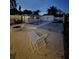 Night view of the backyard with pool and firepit at 4609 19Th W St, Bradenton, FL 34207