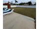 Large grassy backyard with lounge chairs and games at 4609 19Th W St, Bradenton, FL 34207