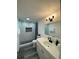 Updated bathroom with a walk-in shower and modern vanity at 4609 19Th W St, Bradenton, FL 34207