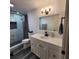 Updated bathroom with a walk-in shower and modern vanity at 4609 19Th W St, Bradenton, FL 34207