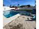 Relaxing pool area with fire pit and lounge chairs at 4609 19Th W St, Bradenton, FL 34207