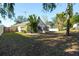 Large backyard with a screened porch at 4927 69Th E Ct, Palmetto, FL 34221