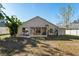 Back of house with screened porch and patio at 4927 69Th E Ct, Palmetto, FL 34221