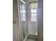 Bathroom with shower stall and grey flooring at 4969 Pebble Beach Ave, Sarasota, FL 34234