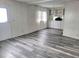 Dining area with gray flooring and built-in cabinets at 4969 Pebble Beach Ave, Sarasota, FL 34234