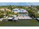 Aerial view of waterfront home with private boat dock at 505 69Th St, Holmes Beach, FL 34217