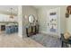 Bright and airy entryway with a console table and view into the kitchen at 505 69Th St, Holmes Beach, FL 34217