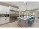 Modern kitchen featuring stainless steel appliances and a large island at 505 69Th St, Holmes Beach, FL 34217