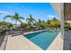 Inviting pool area with lounge chairs, offering a relaxing waterfront view at 505 69Th St, Holmes Beach, FL 34217