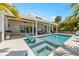 Relaxing pool area with patio furniture at 505 69Th St, Holmes Beach, FL 34217