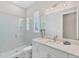 Modern bathroom with a glass shower and white vanity at 5204 Title Row Dr, Bradenton, FL 34210