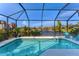 Relaxing pool and lanai with lake views and screened enclosure at 5204 Title Row Dr, Bradenton, FL 34210