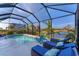 Enjoy this relaxing pool and lanai with comfortable seating at 5204 Title Row Dr, Bradenton, FL 34210