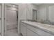 Double vanity bathroom with marble countertop and separate tub/shower at 5216 Adega Way, Bradenton, FL 34211