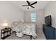 Bright bedroom with a comfortable bed, nightstand, and TV at 5216 Adega Way, Bradenton, FL 34211