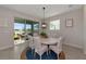 Dining room with sliding glass doors leading to backyard view at 5216 Adega Way, Bradenton, FL 34211