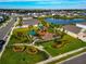 Community playground with play structures and shaded seating at 5216 Adega Way, Bradenton, FL 34211