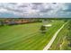 Aerial view of golf course and homes in a luxury community at 5517 Palmer Cir # 101, Bradenton, FL 34211