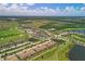 Community overview featuring a golf course, pool, and tennis courts at 5517 Palmer Cir # 101, Bradenton, FL 34211