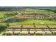 Luxury community with lake, golf course, and numerous residences at 5517 Palmer Cir # 101, Bradenton, FL 34211