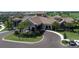 Elegant community clubhouse with Mediterranean architecture, landscaping, and ample parking at 5517 Palmer Cir # 101, Bradenton, FL 34211