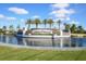 Lakewood National entrance with palm trees and water feature at 5517 Palmer Cir # 101, Bradenton, FL 34211