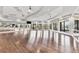 Large dance studio with wood floors and mirrors at 5517 Palmer Cir # 101, Bradenton, FL 34211